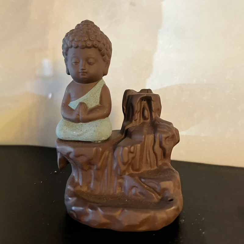 Buddha backflow burner